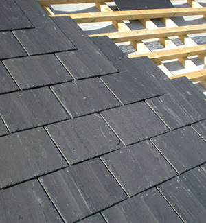 Part way through a slate roof in Reading